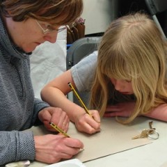 A mother and daughter take part in drawing at York Art Gallery.