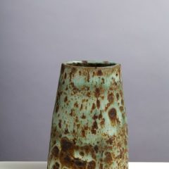 Abstract vase with green and brown mottled surface